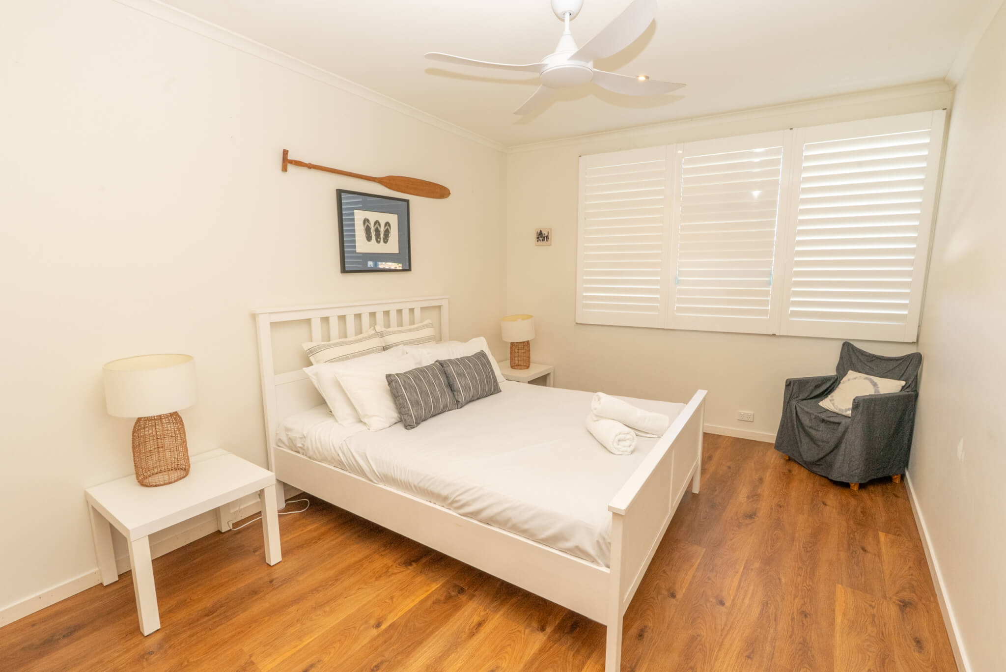 Stylish bedroom with simple décor and beach house feel