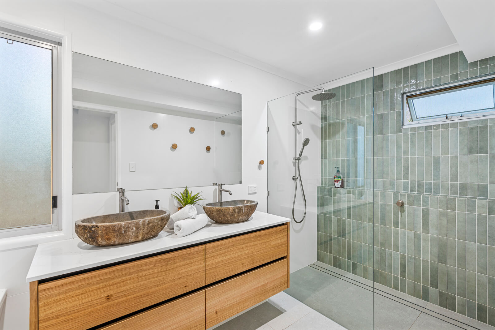 Holiday bathroom with tidy finish and natural light