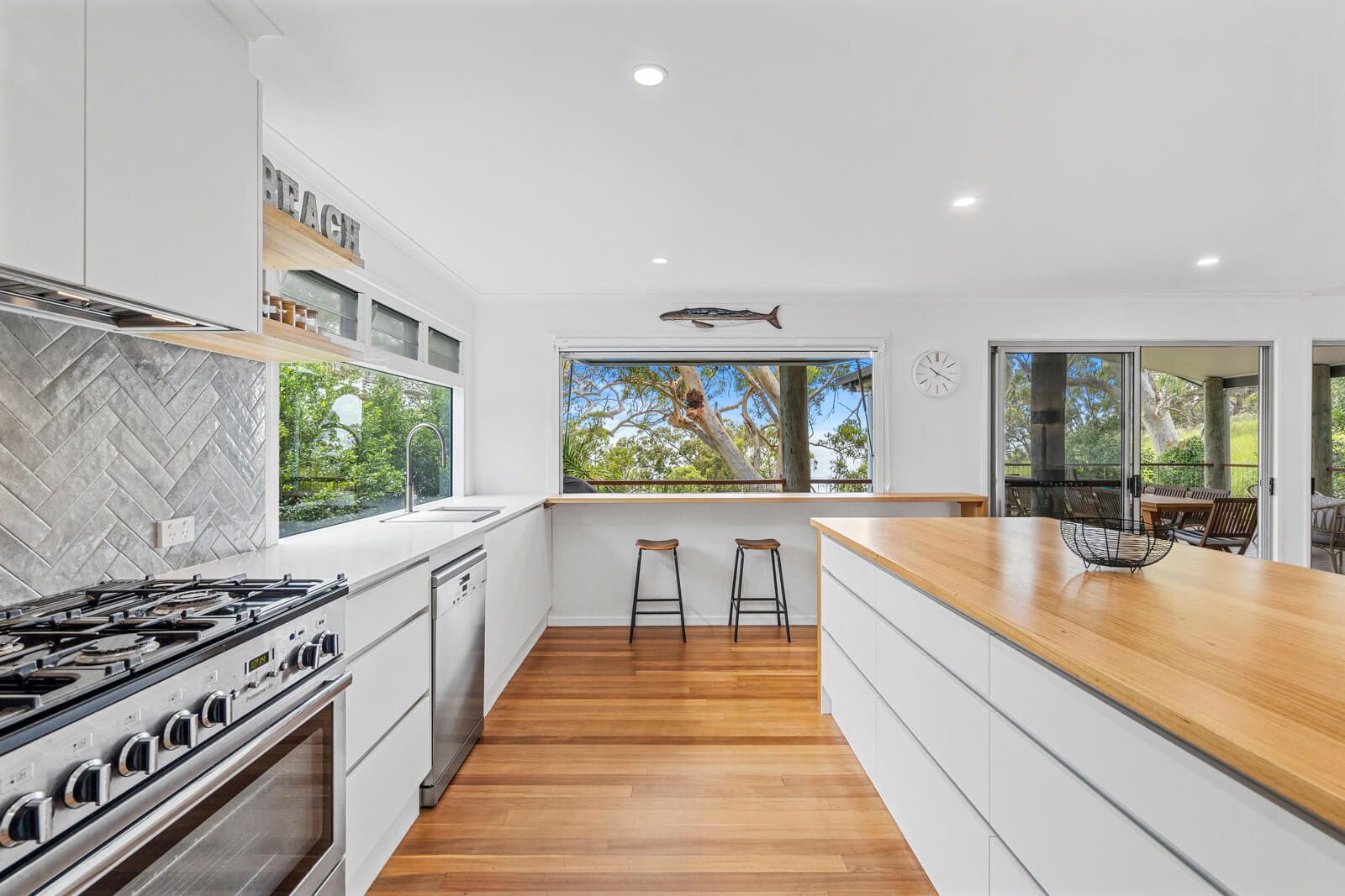 Breakfast bar with wide views of the coast and trees