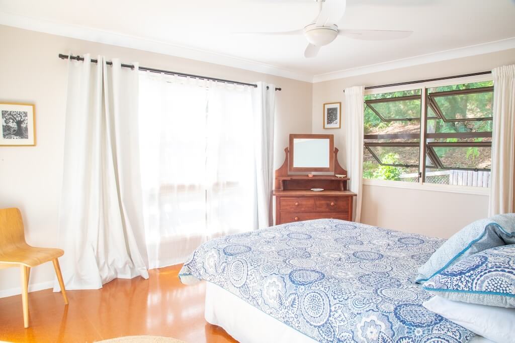 Tramican Bright bedroom with balcony doors