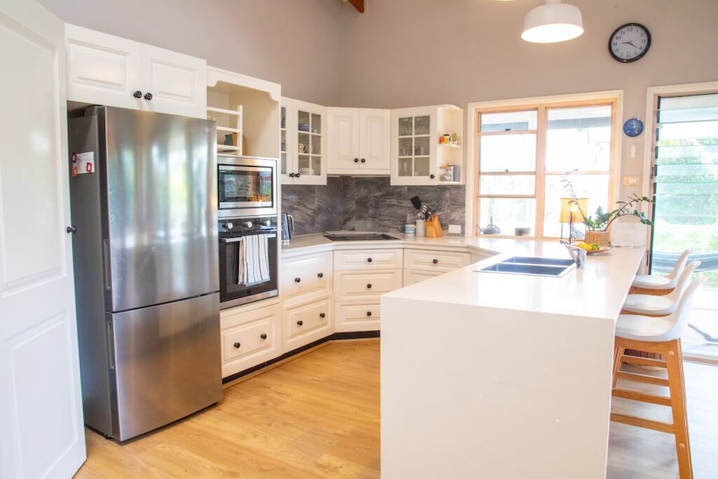 Tramican Modern kitchen with white cabinetry