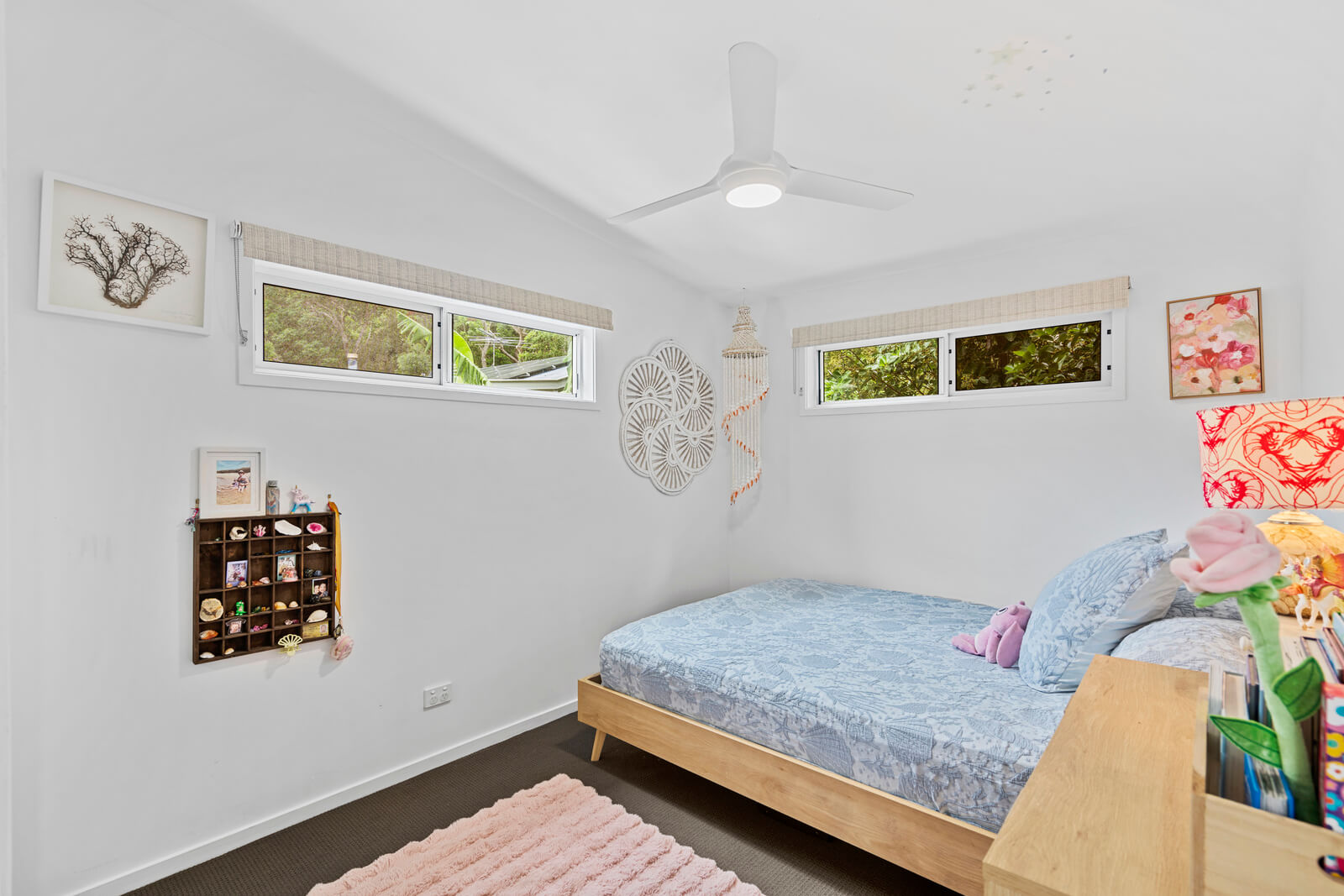 Cozy bedroom with soft furnishings and island charm
