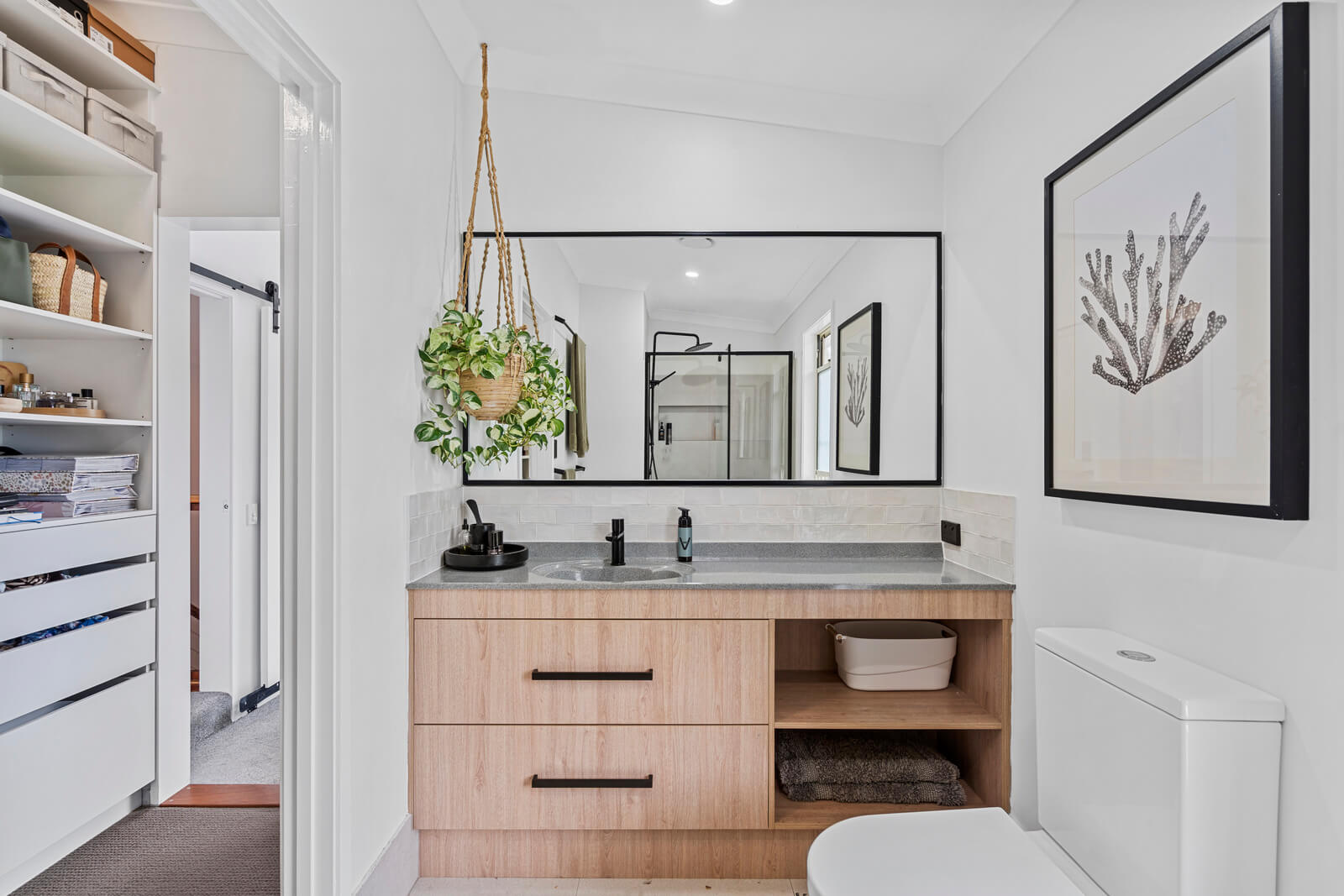 Ensuite with shower, toilet and storage space