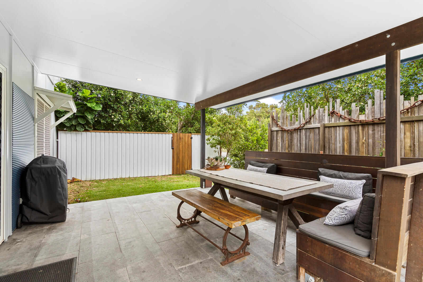 52 Samarinda Drive, Point Lookout Outdoor patio with plants and casual seating