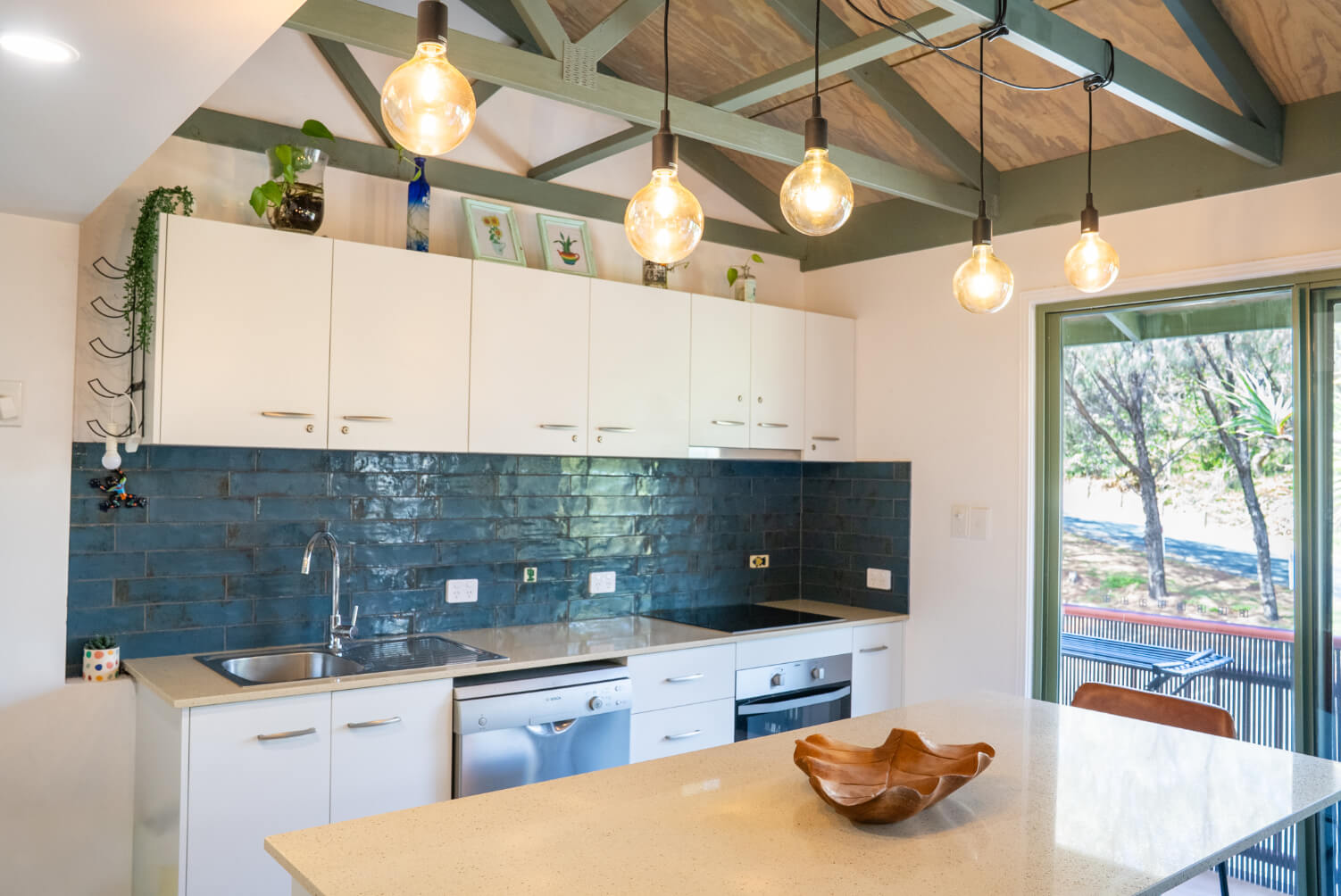 Open kitchen with practical layout and bright finish