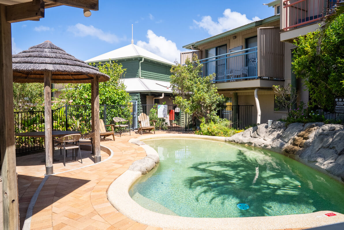 Resort-style pool area near coastal accommodation
