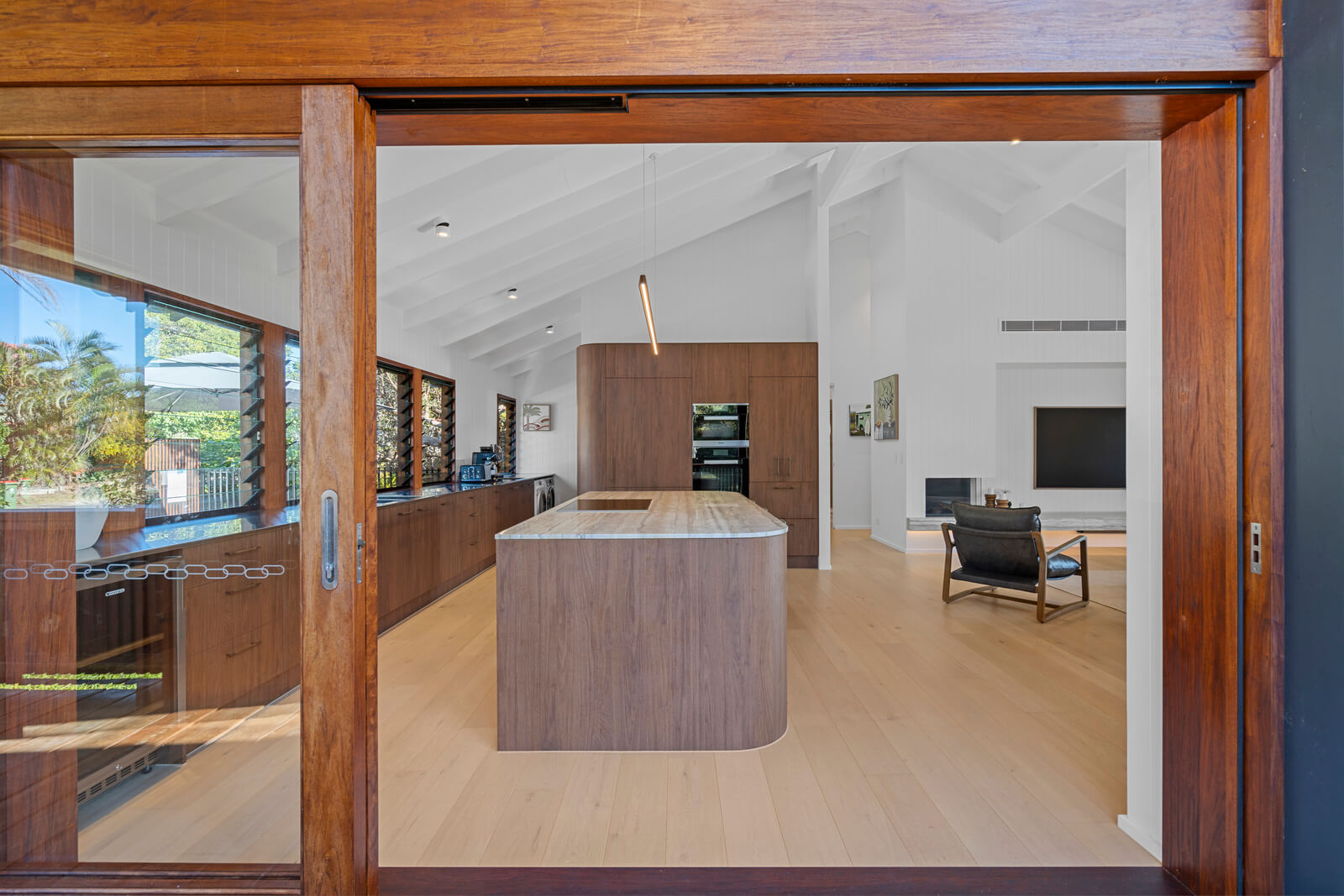 Coastal home accommodation kitchen and dining area 6 Karboora Drive Point Lookout