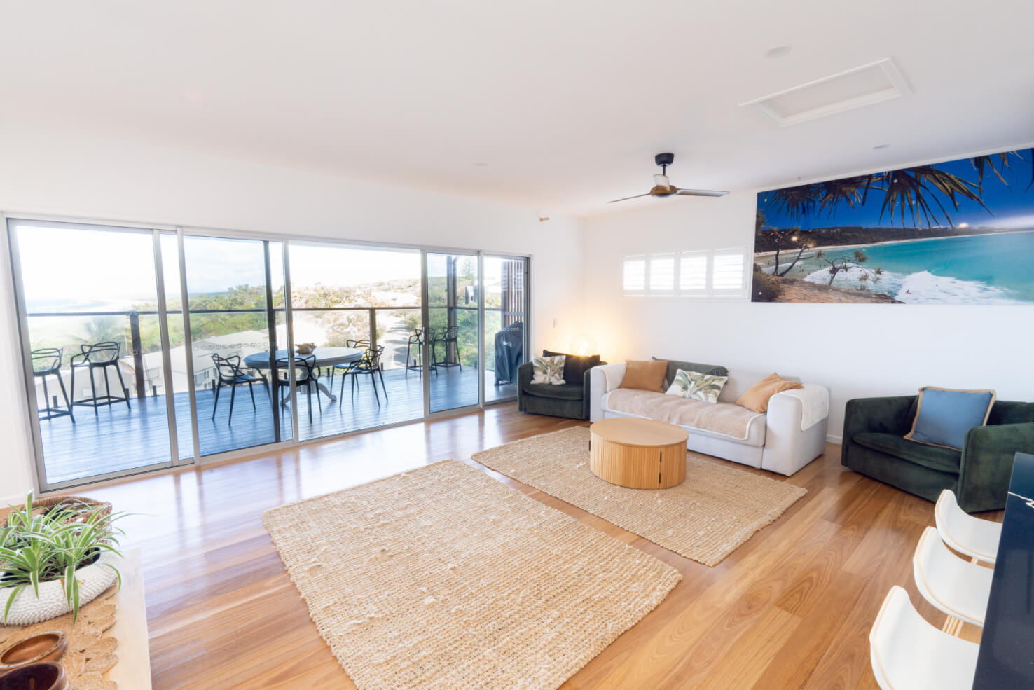 Coastal home accommodation open plan living area with views