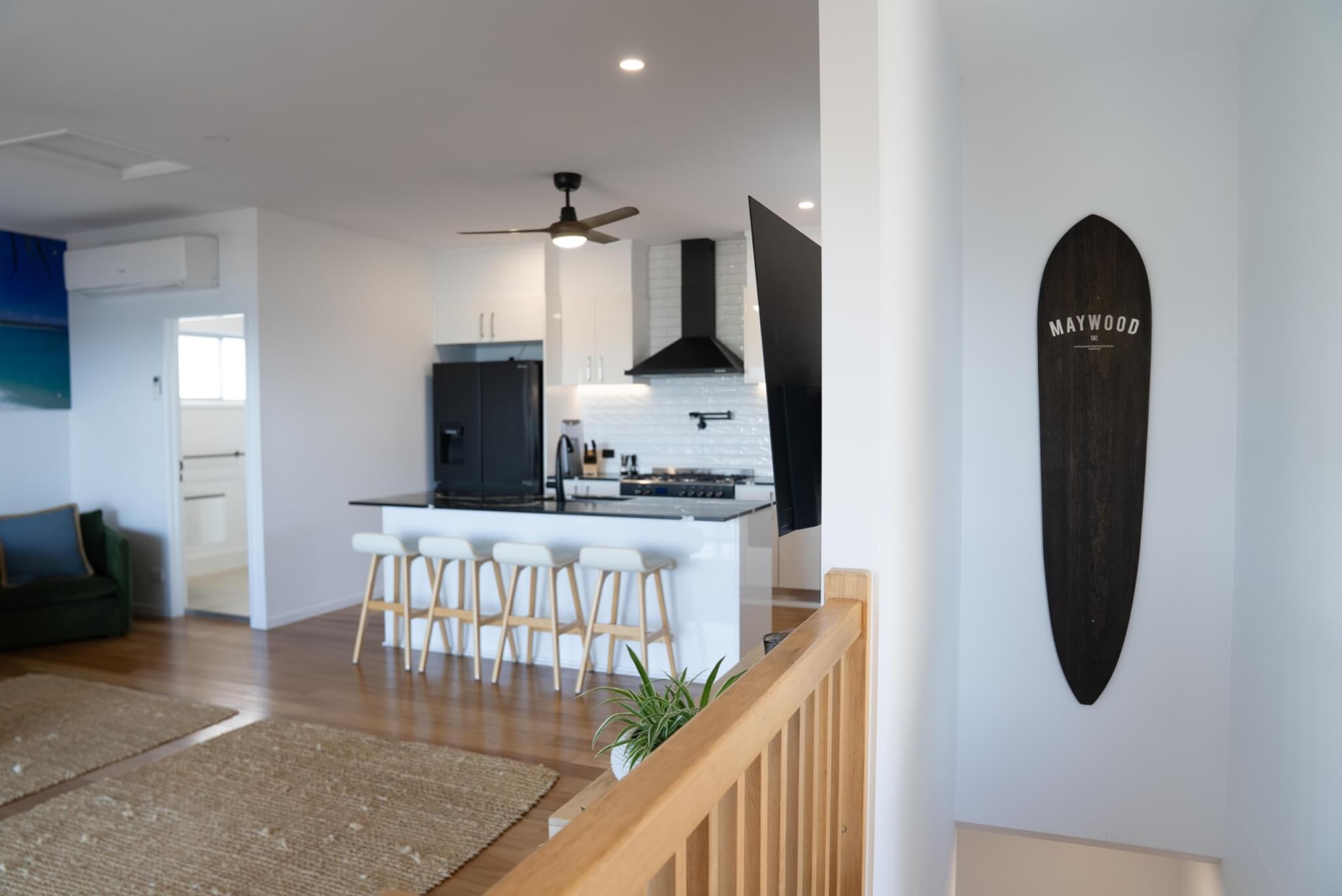 Coastal home accommodation kitchen island and dining area