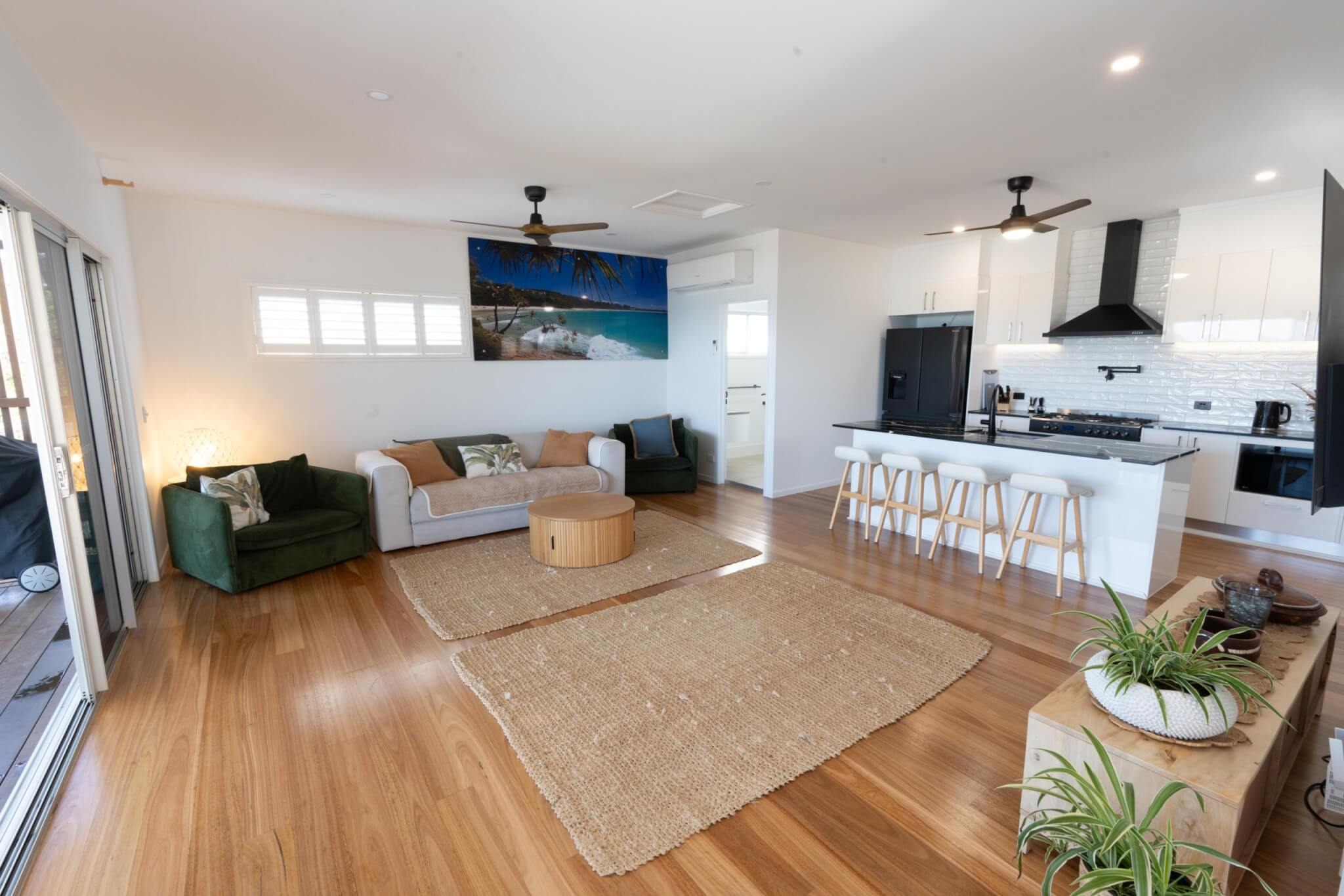 Coastal home accommodation deck dining with ocean views