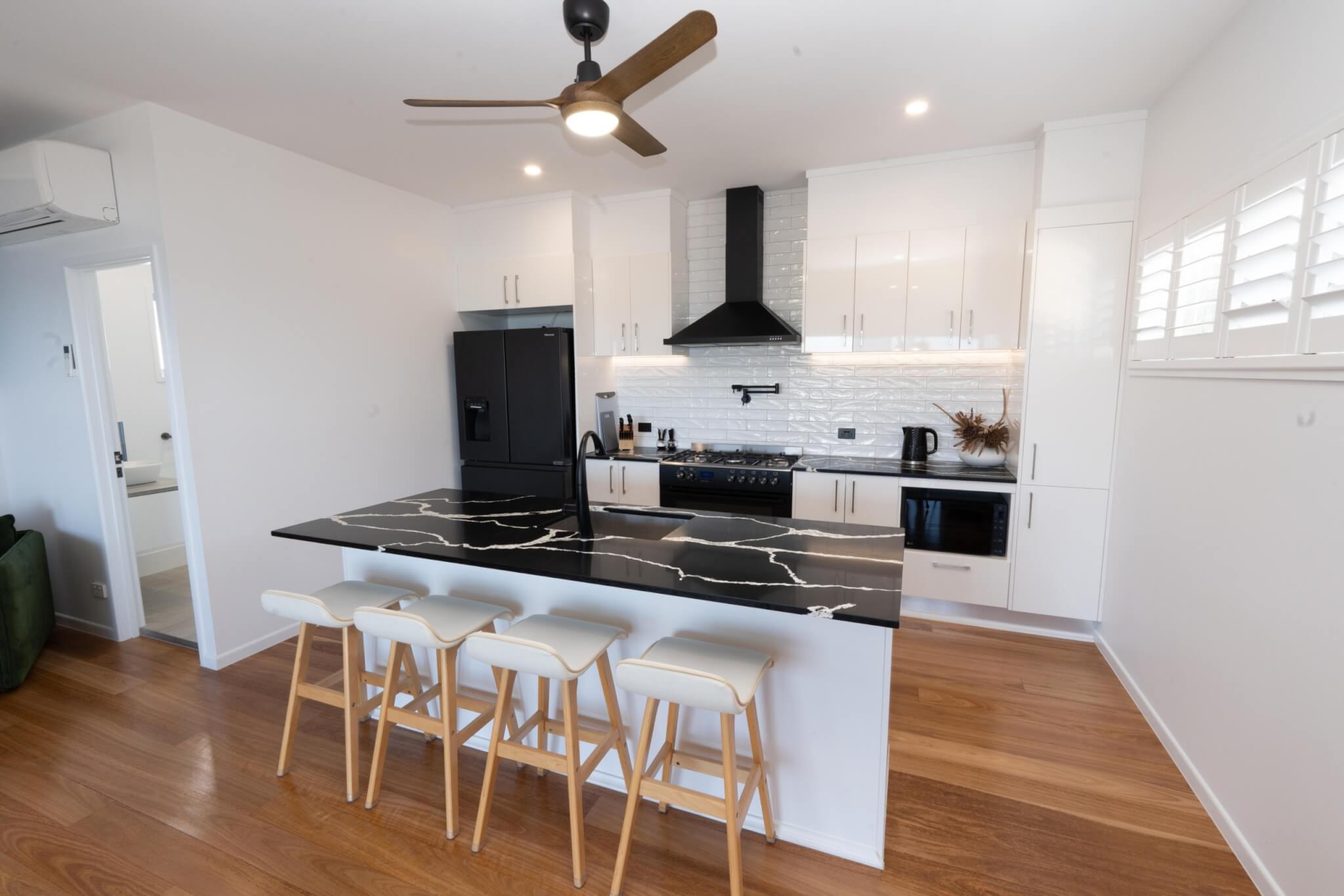 Coastal home accommodation kitchen and dining space Point Lookout