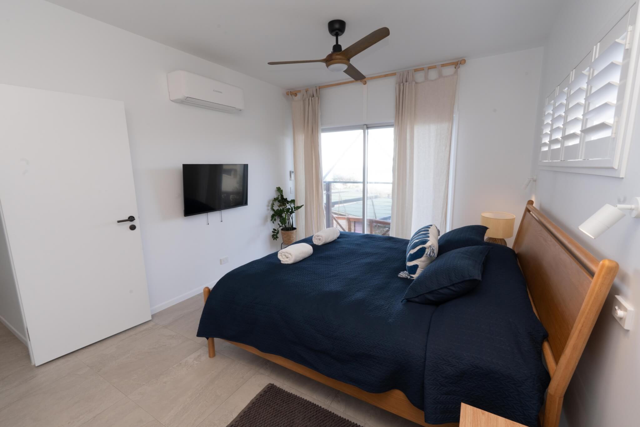 Coastal home accommodation bedroom with ocean views